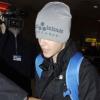 Justin Bieber arrive à l'aéroport d'Heathrow à Londres le 15 février 2011