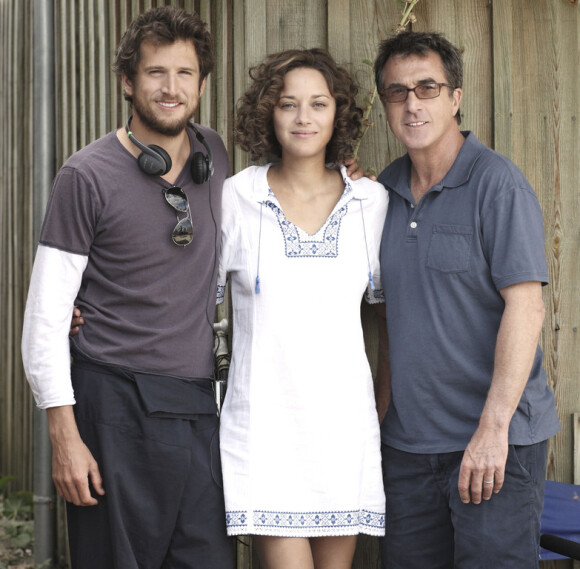 L'équipe du film Les Petits mouchoirs : le réalisateur Guillaume Canet avec ses acteurs Marion Cotillard et François Cluzet