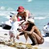 Lilly Becker et son fils Amadeus, en compagnie de la nounou sur la plage à Miami le 8 mars 2011