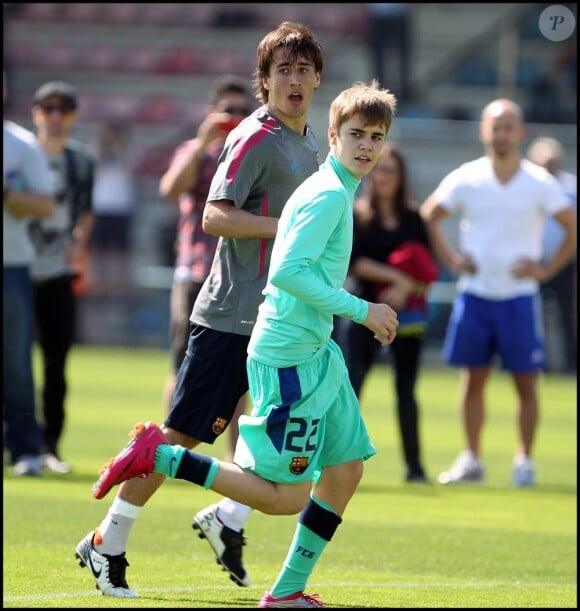 Justin Bieber s'entraîne avec le FC Barcelone, le 7 avril à Barcelone - ici avec Maxwell