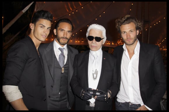 Baptiste Giabiconi, Sebastien Rondeau, Karl Lagerfeld et un mannequin, lors du dîner en l'honneur de Karl Lagerfeld, à Antibes, le 8 mai 2011