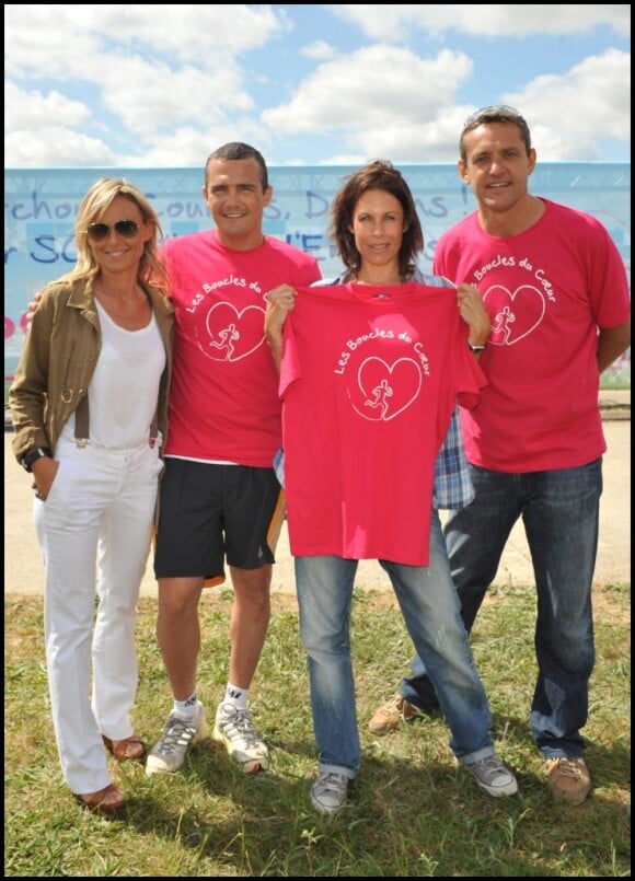 Cécile de Ménibus, Richard Virenque, Astrid Veillon et Jacky Durand lors des Boucles du Coeur, le 22 mai 2011, à l'Hippodrome de Longchamp. Une manifestation organisée au profit de SOS Villages d'Enfants.