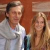 Nicolas de Tavernost et sa fille lors des Internationux de France de Roland-Garros, à Paris, le 28 mai 2011.