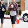 Après son sport, Katie Holmes passe un moment shopping avec une copine ! Beverly Hills, 14 juin 2011
