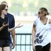 Heidi Klum fait son jogging avec le mannequin Coco Rocha dans le cadre de son Summer Run. New York, le 9 juillet 2011