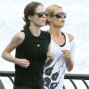 Heidi Klum fait son jogging avec le mannequin Coco Rocha dans le cadre de son Summer Run. New York, le 9 juillet 2011