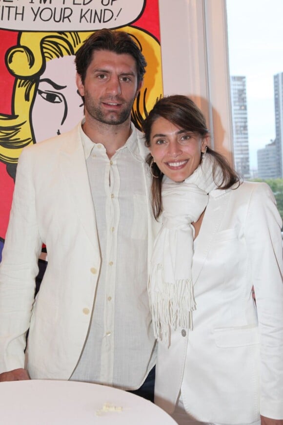 Caterina Murino, accompagnée de son homme Pierre Rabadan, lors de la soirée blanche organisée par Pierre Guillermo, le 14 juillet 2011.