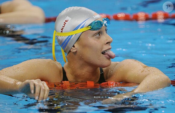 Mondiaux de natation de Shanghai 2011 : Federica Pellegrini réalise le doublé 200-400 m nage libre, comme à Rome en 2009, mais avec Philippe Lucas cette fois.