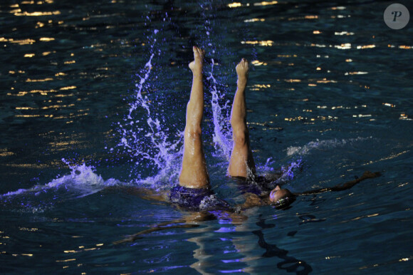 Un magnifique ballet de natation synchronisée lors du 50e anniversaire du stade nautique Prince Rainier III à Monaco le 19 août 2011