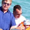 Elton John et David Furnish à Saint-Tropez le 18 août 2011, arrivant au club 55