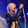 En concert avec The Pretty Reckless lors du Jazz Festival de Montreux, la rockstar Taylor Momsen la joue provoc' avec son tee-shirt et ses bottes à multiples boucles. Montreux, le 4 juillet 2011.
