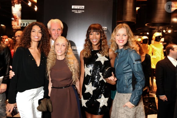 Afef Jnifen, Marco Tronchetti Provera, Franca Sozzani, Naomi Campbell et Eva Herzigova à la soirée d'ouverture de la boutique Pirelli à Milan le 20 septembre 2011