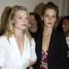 Mélanie Thierry et Marine Vacth au défilé Yves Saint Laurent lors de la Fashion Week parisienne le 3 octobre 2011