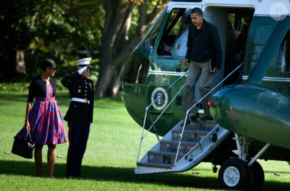 Barack Obama et sa femme Michelle revenant d'un weekend à Camp David le 9 octobre 2011 à Washington