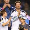 David Beckham et ses enfants Brooklyn et Romeo le 16 octobre 2011 lors d'un match face aux Chivas USA au Home Depot Center de Los Angeles