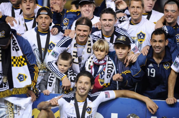 David Beckham et ses trois fils Brooklyn, Romeo et Cruz le 20 novembre 2011 lors de la finale de MLS au Home Depot Center de Carson à Los Angeles