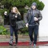 Hilary Duff et son époux Mike Comrie sous la pluie de Los Angeles, le dimanche 20 novembre 2011.