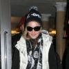 Madonna sort du centre de la Kabbale à New York City, en compagnie de ses enfants, le samedi 10 décembre 2011.