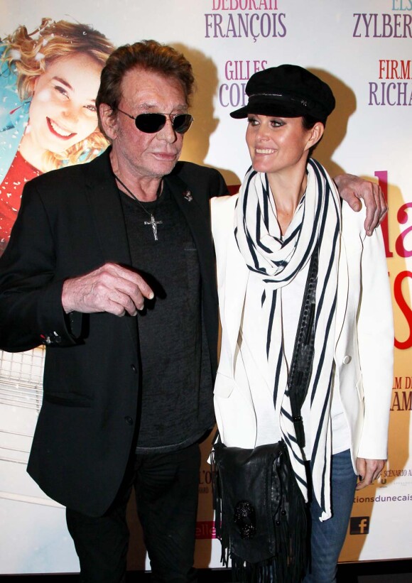 Johnny et Laeticia Hallyday à l'avant-première des Tribulations d'une caissière, à Paris, le 12 décembre 2011.