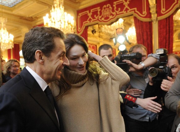 Carla Bruni et Nicolas Sarkozy lors du Noël de l'Elysée le 14 décembre 2011