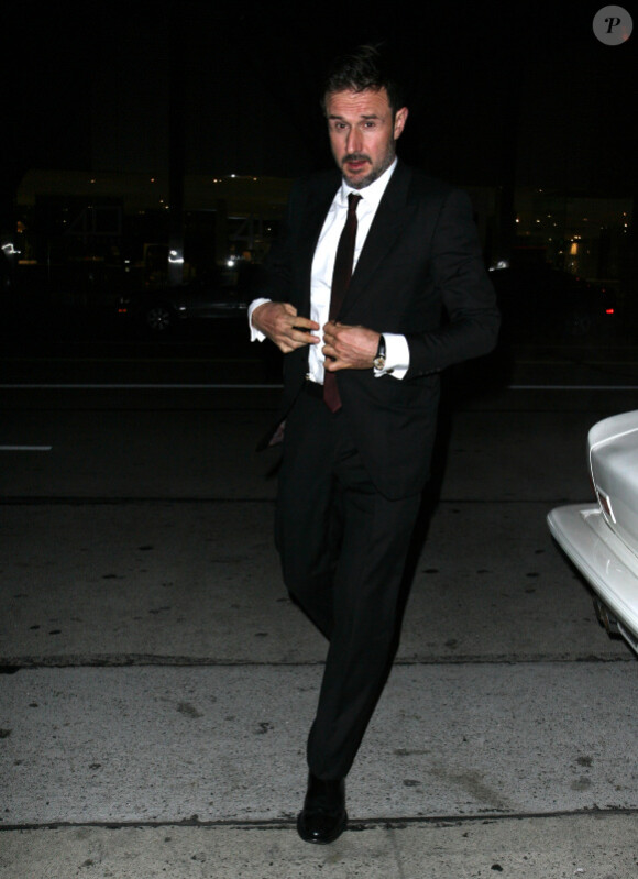 David Arquette sort diner au restaurant Madeo avec sa compagne Christina McLarty à Los Angeles, le 30 décembre 2011.