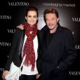 Laeticia et Johnny Hallyday au lancement du sac Vavavoom de Valentino,  vendu en édition limitée et en exclusivité au magasin Montaigne Market à  Paris, le 25 janvier 2012