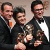 Jean Dujardin, Thomas Langmann et Michel Hazanavicius lors des BAFTAs 2012, le 12 février à Londres.