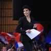 Rachida Dati rejoint le pupitre du meeting de Nicolas Sarkozy, à Lille, le 23 janvier 2012.