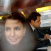 Rachida Dati et Nicolas Sarkozy assis côte à côte dans le train pour Lille au départ de Paris, le 23 février 2012.