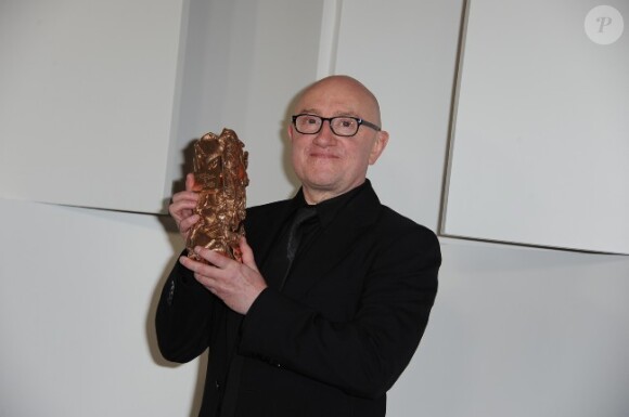 Michel Blanc et son prix du meilleur acteur dans un second rôle, pour L'Exercice de l'Etat, aux César le 24 février 2012