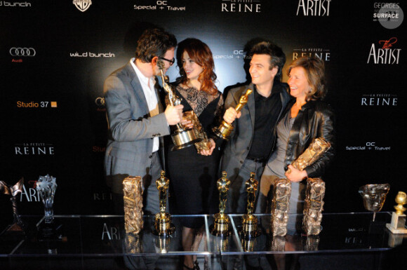 Michel Hazanavicius, Bérénice Bejo et Thomas Langmann lors de la soirée The Artist au restaurant Le Georges à Paris le 6 mars 2012