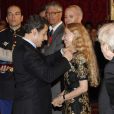 Nicolas Sarkozy a décoré Franca Sozzani, directrice du  Vogue  Italie, ainsi que dix autres personnalités du monde des arts et du spectacle, le 14 mars 2012.