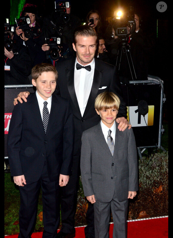 David Beckham et ses enfants Brooklyn et Romeo le 19 décembre 2011 à Londres