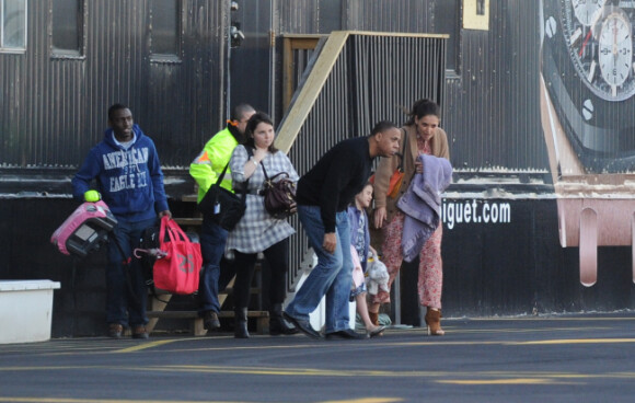 Katie Holmes et Suri Cruise quittent leur appartement new-yorkais et se rendent à l'héliport, le 27 mars 2012 à New York