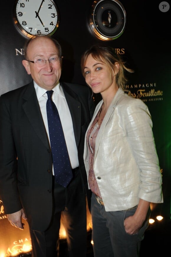 Le directeur général Dominique Pierre et Emmanuelle Béart à la soirée Nicolas Feuillate, à Paris. Avril 2012