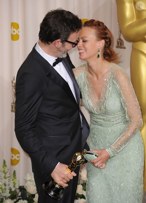 Bérénice Bejo et son mari Michel Hazanavicius lors des Oscars en 2012
