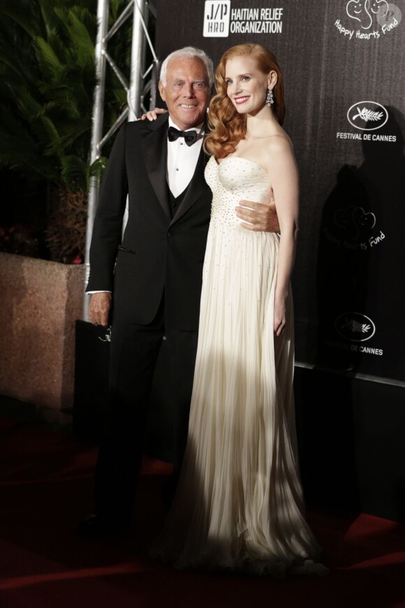 Giorgio Armani et Jessica Chastain assistent à la soirée Carnaval d'Haïti animée par Sean Penn. Cannes, le 18 mai 2012.