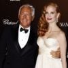 Giorgio Armani et Jessica Chastain assistent à la soirée Carnaval d'Haïti animée par Sean Penn. Cannes, le 18 mai 2012.