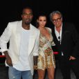 Kanye West, Kim Kardashian et Giuseppe Zanotti lors de l'avant-première du film Cruel Summer à Cannes, le 23 mai 2012.
