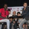 Jamel Debbouze et Omar Sy lors de la présentation du deuxième Festival de rire de Marrakech à Marrakech le vendredi 8 juin 2012