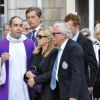 Jacques Vendroux, Françoise Boulain et son fils Gary lors des obsèques de Thierry Roland le 21 juin 2012 en l'église Sainte-Clotilde à Paris