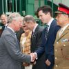 Le prince Charles rencontre Tim Henman à Wimbledon le 27 juin 2012, pour sa première visite depuis 1970.