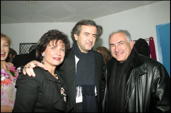 Anne Sinclair, Dominique Strauss-Kahn et Bernard-Henri Lévy à Paris, le 9 mars 2000.