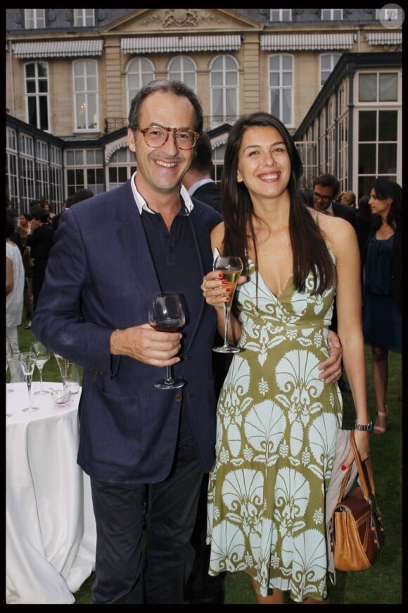 Emmanuel de Brantes et son amie à la garden-party Cartier le 2 juillet 2012 à Paris