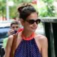 Katie Holmes passe une journée complice avec sa fille et ses amis à New York, le 5 juillet 2012