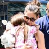 Katie Holmes passe une journée complice avec sa fille et ses amis à New York, le 5 juillet 2012