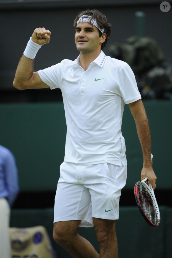 Roger Federer, le point serré, victorieux de Novak Djokovic en demi-finale du tournoi de Wimbledon. Londres, le 6 juillet 2012.