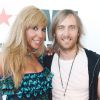 David Guetta et sa femme Cathy hyper fiers d'inaugurer le F*** Me I'm Famous Lounge Club au coeur de l'aéroport d'Ibiza, le 17 juillet 2012.