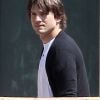 Ashton Kutcher a repéré les paparazzi lors d'une sortie ciné pour aller voir The Dark Knight Rises. Le 22 juillet 2012