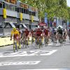Le tournage de La Grande Boucle le 22 juillet 2012. Il se trouve sur les Champs-Elysées avant que les véritables coureurs du Tour de France n'arrivent.